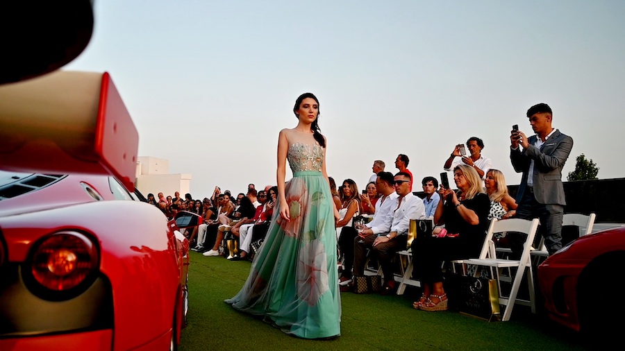 Susana Hidalgo Gown amongst a sea of Ferraris